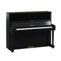 Yamaha upright piano with glossy black finish, set in a showroom.