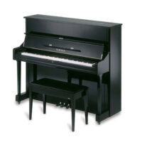 Yamaha black upright piano with matching bench, showroom setting.