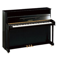 Yamaha upright piano with black polished finish and three pedals.