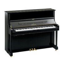 Yamaha upright piano with polished black finish.