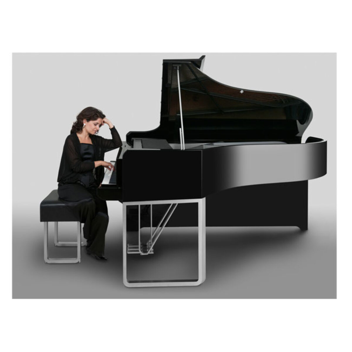Woman playing a black grand piano with modern design in a minimalistic setting.