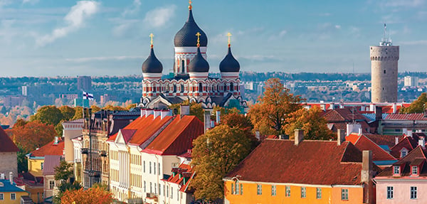 Scenic view of historic Tallinn skyline with St. Alexander Nevsky Cathedral and medieval towers.