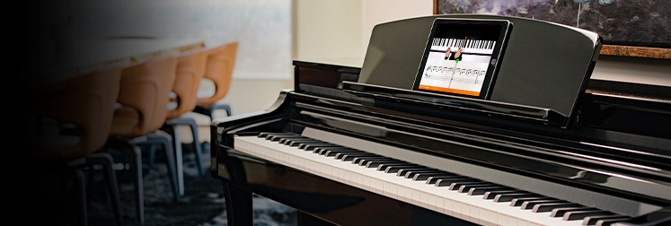 Yamaha Clavinova digital piano showcasing sheet music on screen, perfect for modern musicians at Classic Pianos Reno.