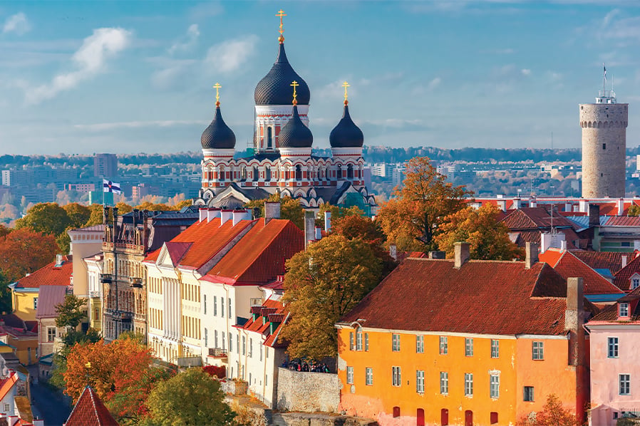 Panoramic view of Tallinn's Old Town with Alexander Nevsky Cathedral and medieval buildings.